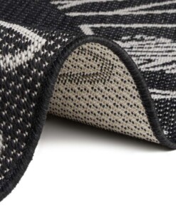 Rond kinderkamer vloerkleed Alfabet - zwart/crème - close up, thumbnail