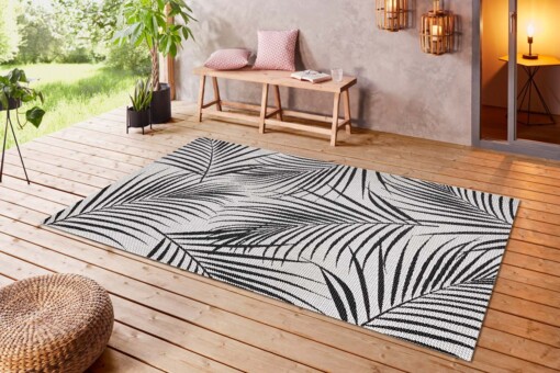 Binnen & buiten vloerkleed Tropical leaf - crème/zwart - sfeer
