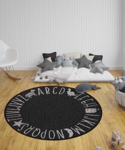 Rond kinderkamer vloerkleed Alfabet - zwart/crème - sfeer