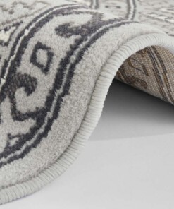 Klassiek vloerkleed rond Saricha Belutsch - grijs - close up rol, thumbnail