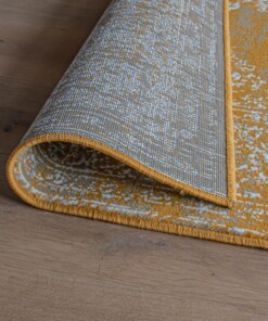 Vintage vloerkleed Joy de Vivre Pixel - okergeel - close up vouw, thumbnail