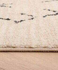 Berber vloerkleed Beni Ouarain Sufian - crème/zwart - close up zijkant, thumbnail Berber vloerkleed Beni Ouarain Sufian - crème/zwart - close up zijkant, thumbnail