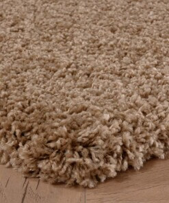Hoogpolig vloerkleed shaggy Grand effen - beige - close up hoek, thumbnail