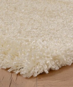 Hoogpolig vloerkleed shaggy Grand effen - crème - close up hoek, thumbnail Hoogpolig vloerkleed shaggy Grand effen - crème - close up hoek, thumbnail