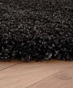 Rond hoogpolig vloerkleed shaggy Grand effen - antraciet - close up zijkant, thumbnail