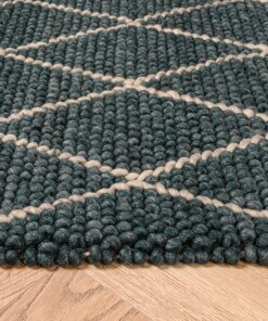Wollen vloerkleed - ruiten Vinduer - petrol/grijs - close up zijkant, thumbnail