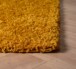 Vierkant hoogpolig vloerkleed shaggy Trend effen - oranje - close up hoek, thumbnail