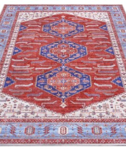 Design vloerkleed Shiraz Niavaran Elle Decoration - rood/blauw - overzicht schuin, thumbnail