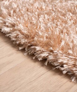 Rond hoogpolig vloerkleed velours Posh - zalmroze - close up zijkant, thumbnail