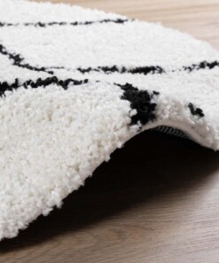 Rond hoogpolig vloerkleed ruiten Artisan - wit/zwart - close up, thumbnail