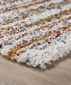 Hoogpolig vloerkleed strepen Artisan - wit/multi - close up hoek, thumbnail