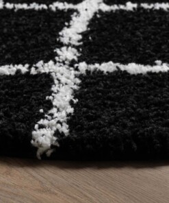 Rond hoogpolig vloerkleed ruiten Habitat - zwart/wit - close up, thumbnail Rond hoogpolig vloerkleed ruiten Habitat - zwart/wit - close up, thumbnail