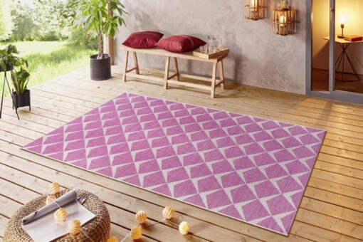Buitenkleed design - Escala roze/crème - sfeer