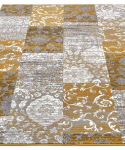 Patchwork vloerkleed Bloques - okergeel - overzicht schuin, thumbnail