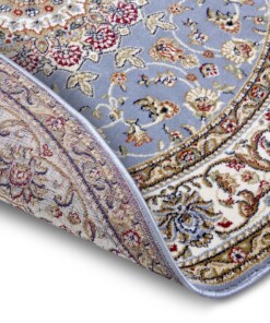 Rond perzisch tapijt - Zuhr lichtblauw - close up, thumbnail