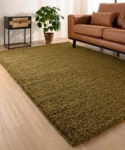 Hoogpolig vloerkleed shaggy Trend effen - olijfgroen - sfeer