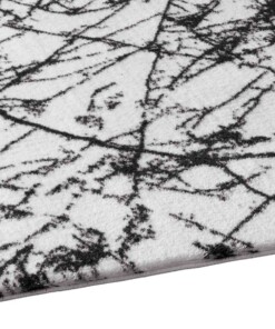 Wasbaar vloerkleed Marmer - Chloé wit/zwart - close up zijkant, thumbnail