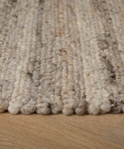 Wollen vloerkleed - Tinn grijs - close up zijkant, thumbnail