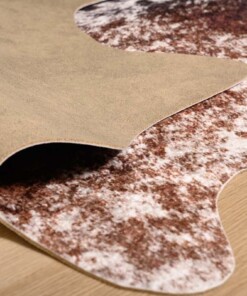 Koeienhuid vloerkleed - Happy Cow Spots bruin/wit - close up vouw, thumbnail