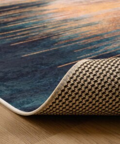 Modern vloerkleed wasbaar - Moderna goud/petrol - close up vouw, thumbnail