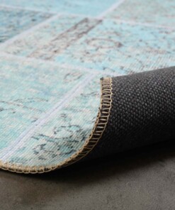 Patchwork vloerkleed - Fade Heritage turquoise - close up vouw, thumbnail