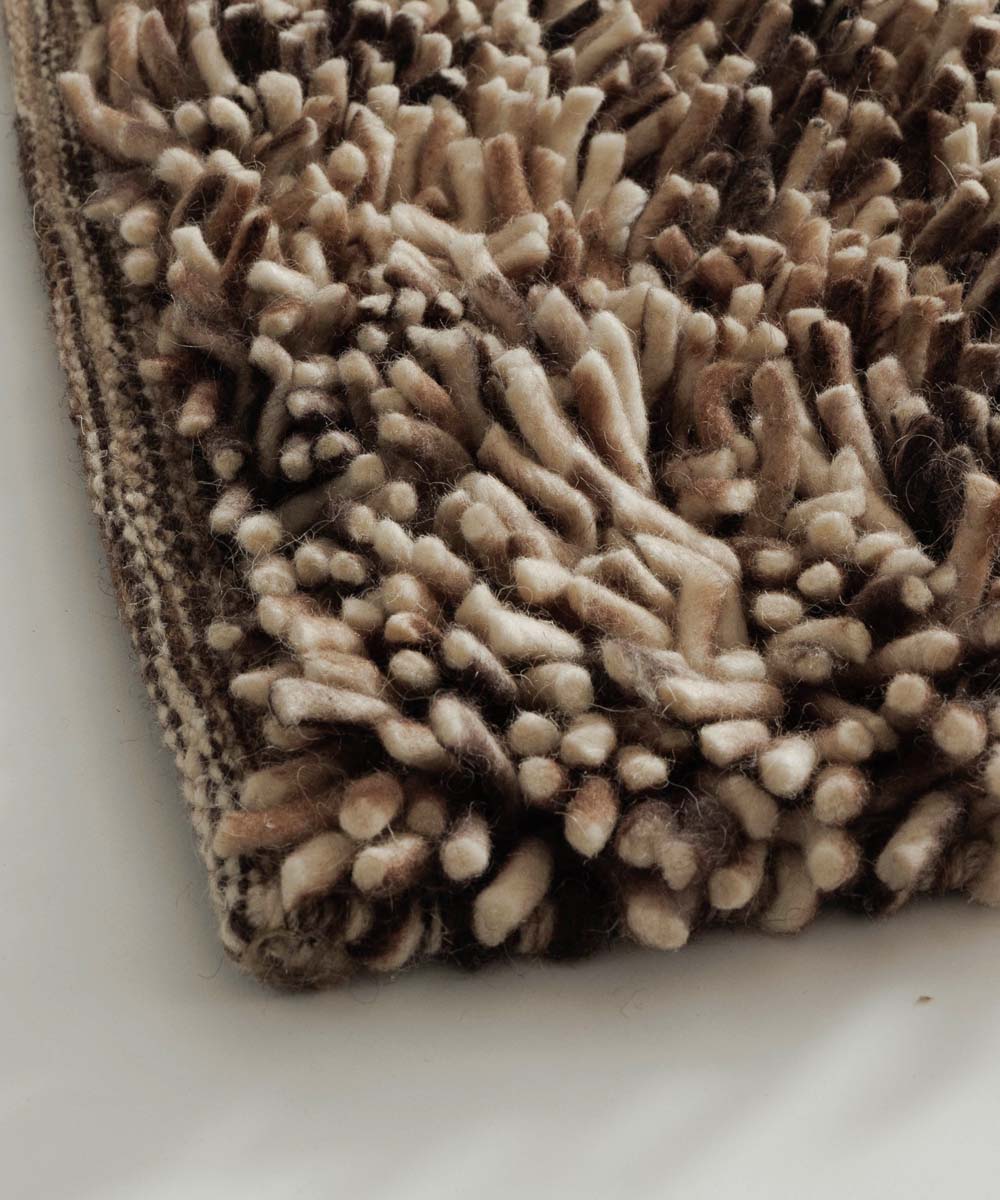 Hoogpolig vloerkleed wol - Aurelia crème/bruin - close up Hoogpolig vloerkleed wol - Aurelia crème/bruin - close up
