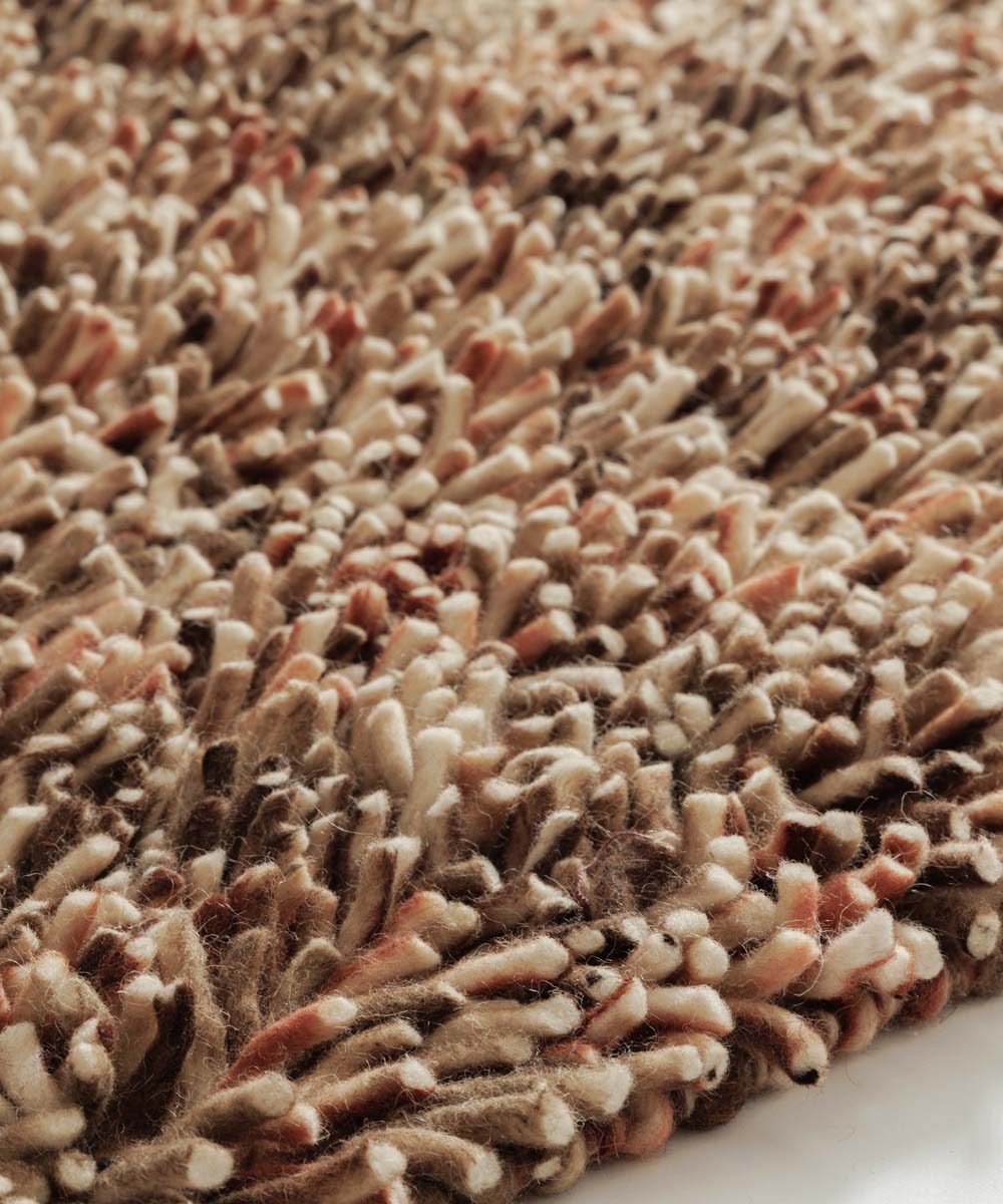 Hoogpolig vloerkleed wol - Aurelia terracotta - close up Hoogpolig vloerkleed wol - Aurelia terracotta - close up