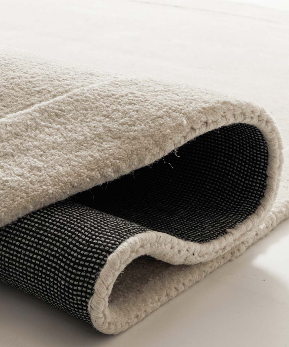 Organisch wollen vloerkleed - Flyt ivoor - close up Organisch wollen vloerkleed - Flyt ivoor - close up