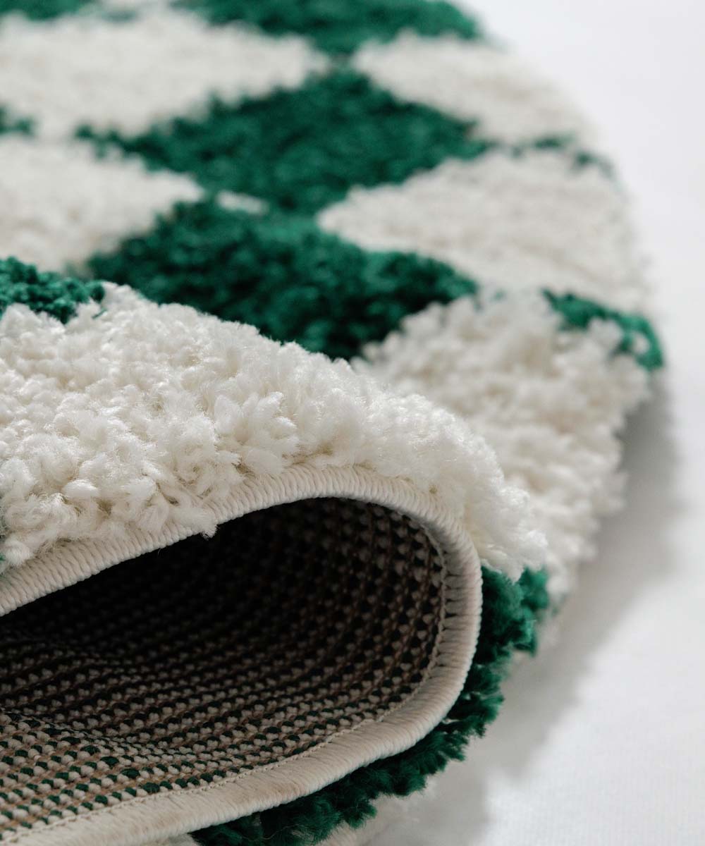 Rond checkerboard vloerkleed - Check ivoor/jade - close up Rond checkerboard vloerkleed - Check ivoor/jade - close up