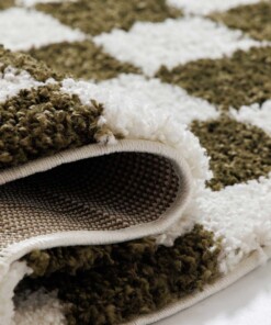 Rond checkerboard vloerkleed - Check ivoor/olijfgroen - close up