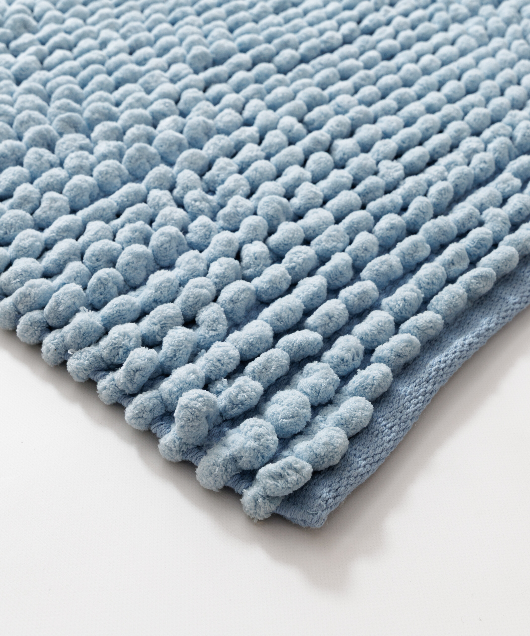 Badmat - Sensa blauw - close up Badmat - Sensa blauw - close up