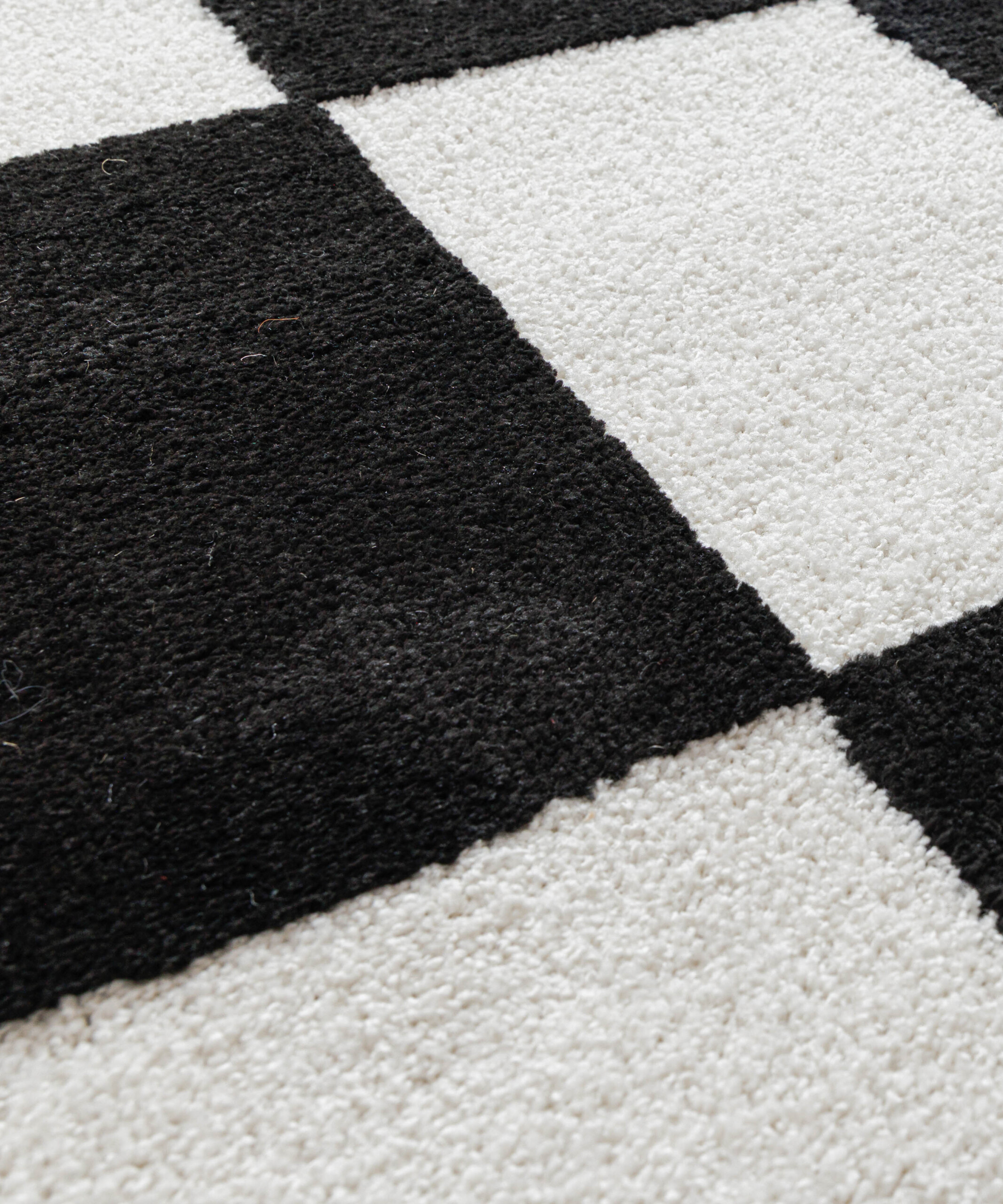 Checkerboard vloerkleed - Nivo Maeve wit/zwart - close up Checkerboard vloerkleed - Nivo Maeve wit/zwart - close up
