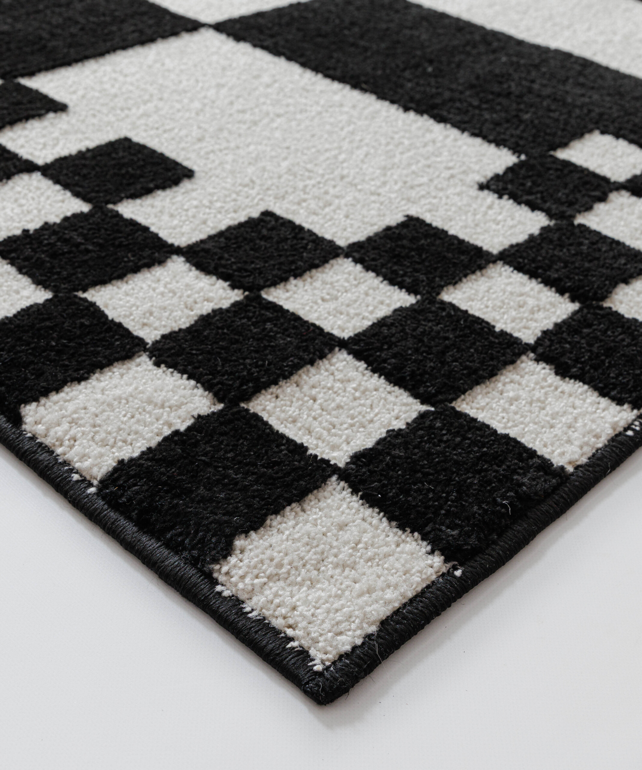Checkerboard vloerkleed - Nivo Maeve wit/zwart - close up Checkerboard vloerkleed - Nivo Maeve wit/zwart - close up