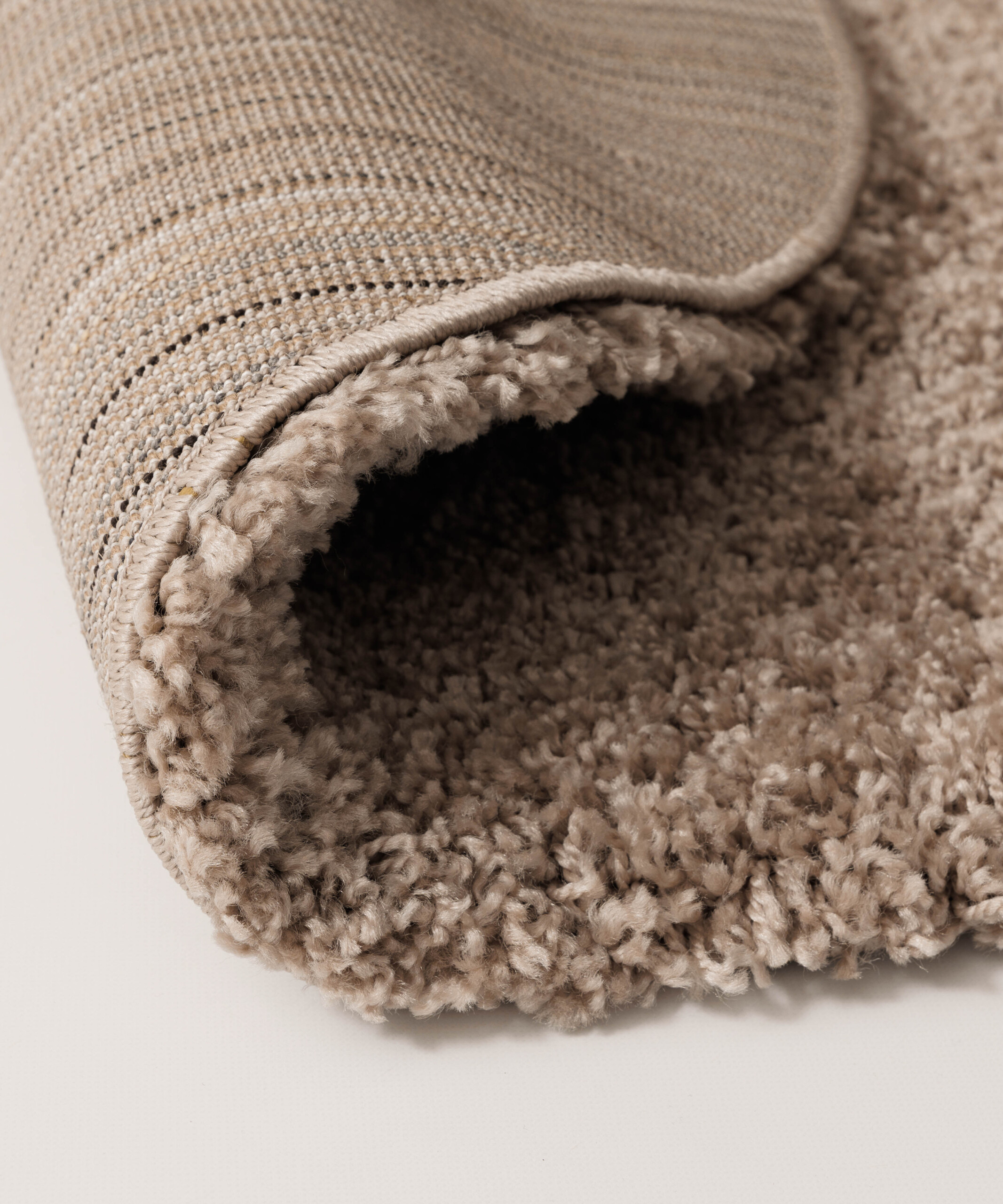 Rond hoogpolig vloerkleed shaggy Grand effen - beige - close up Rond hoogpolig vloerkleed shaggy Grand effen - beige - close up