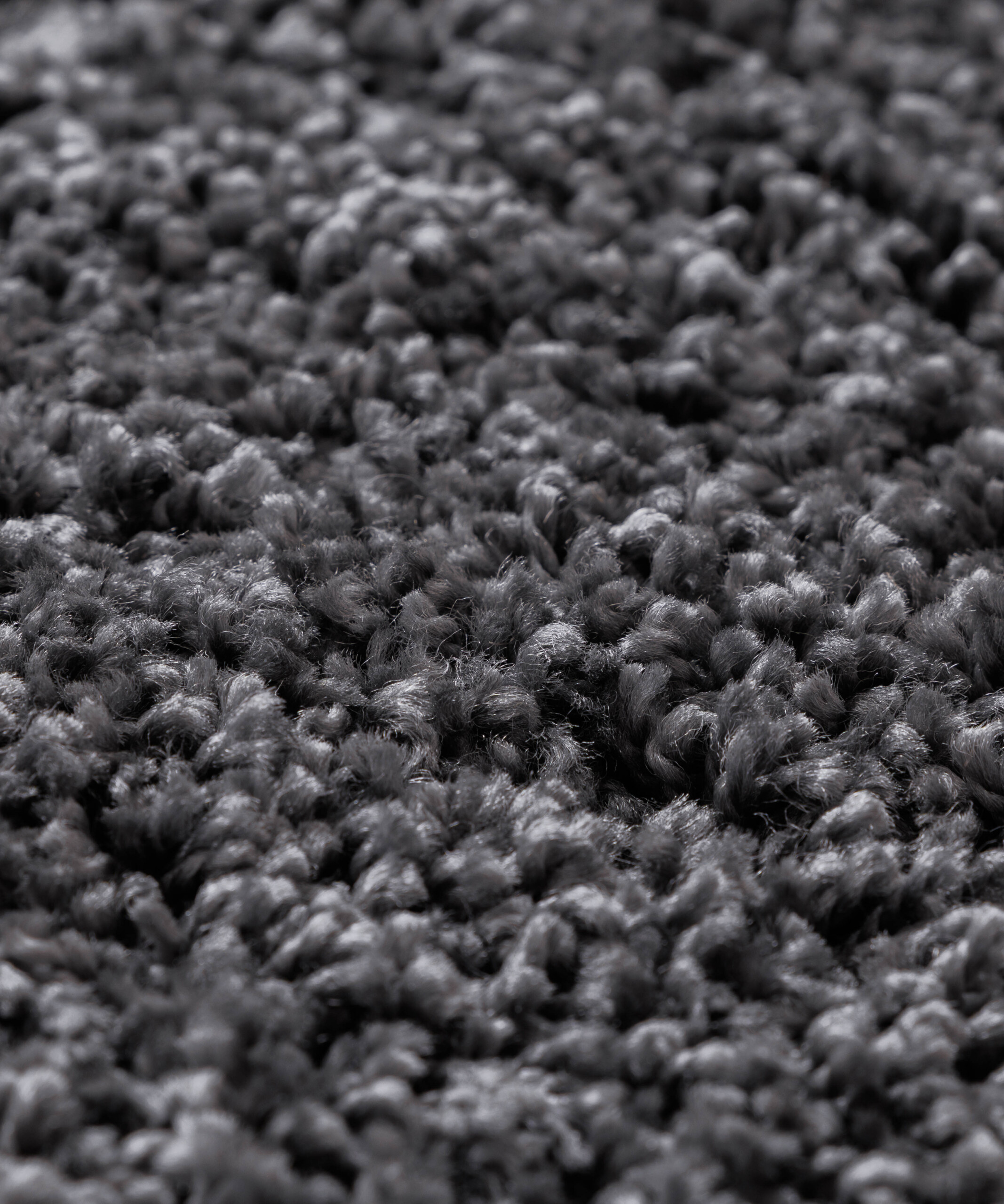 Rond hoogpolig vloerkleed shaggy Grand effen - donkergrijs - close up Rond hoogpolig vloerkleed shaggy Grand effen - donkergrijs - close up