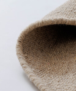 Rond wollen vloerkleed - Grund beige - close up, thumbnail