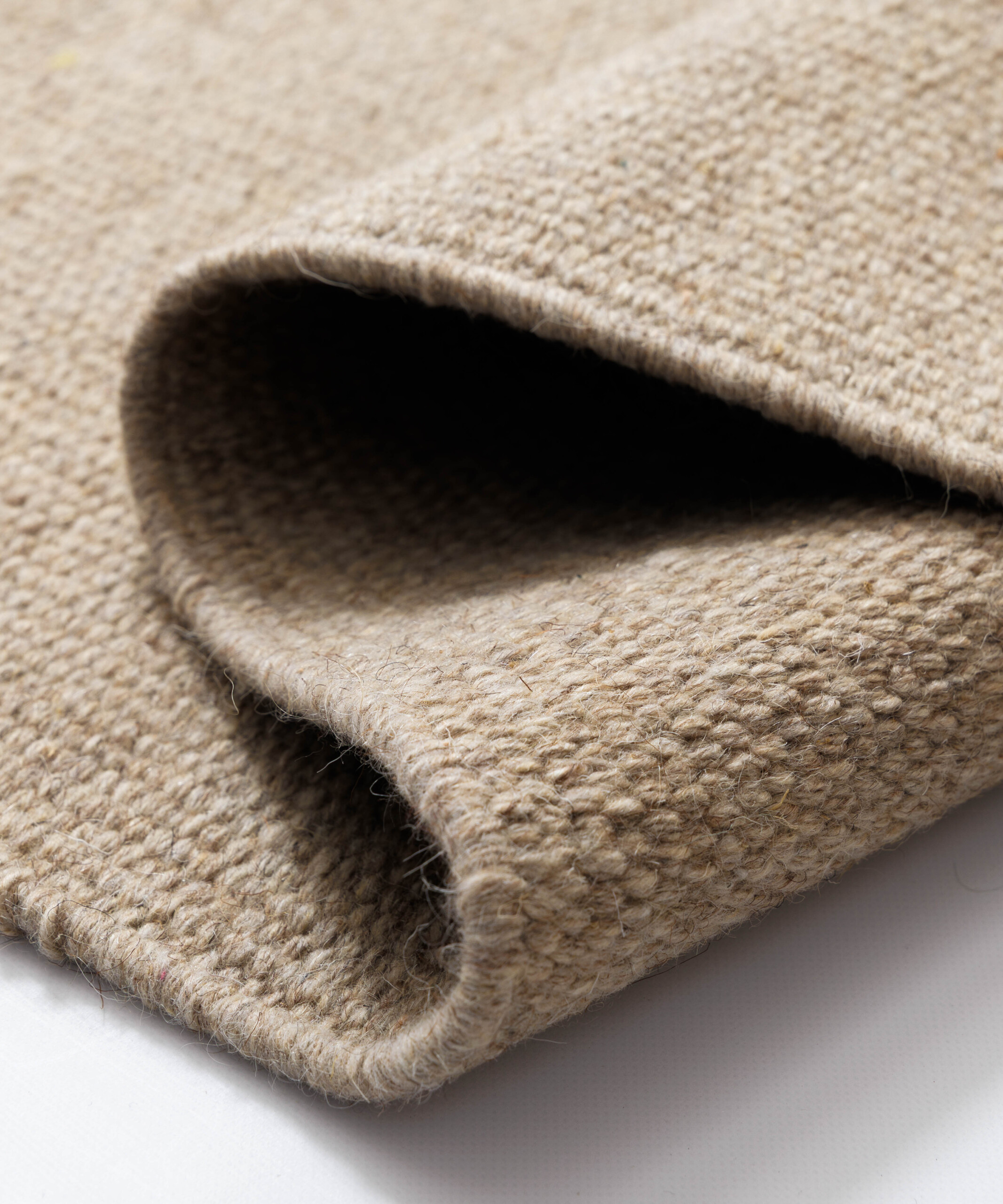 Wollen vloerkleed - Grund beige - close up Wollen vloerkleed - Grund beige - close up