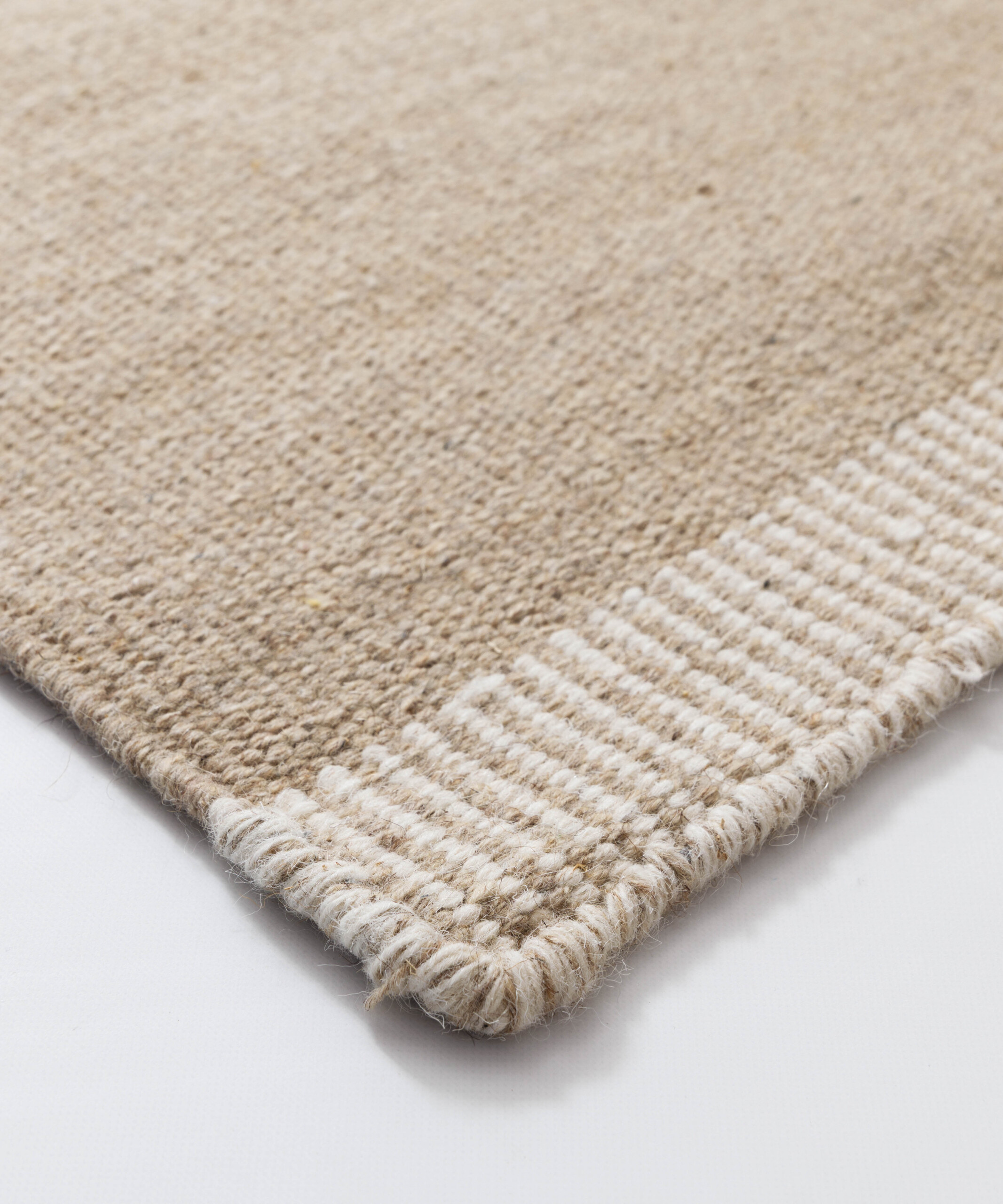 Wollen vloerkleed - Grund beige - close up Wollen vloerkleed - Grund beige - close up
