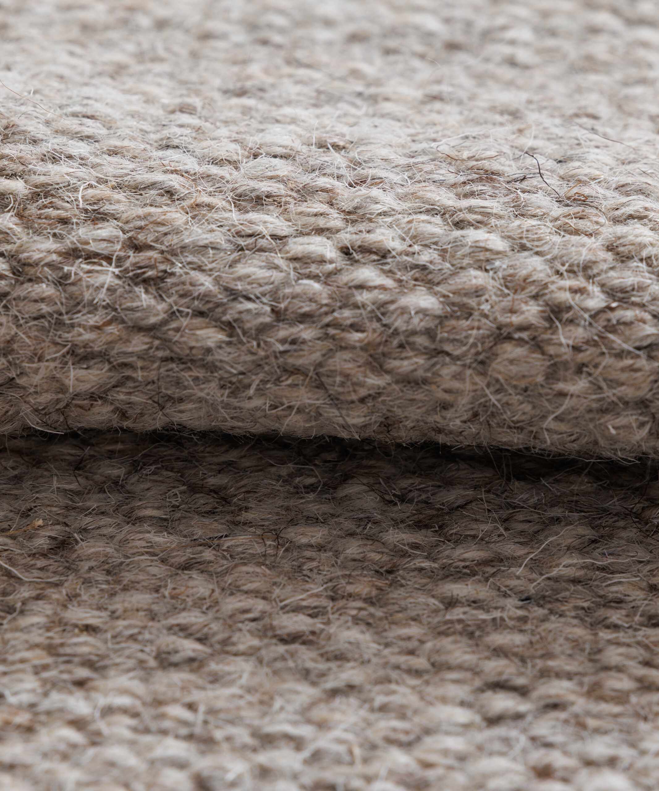 Rond wollen vloerkleed - Grund grijs - close up Rond wollen vloerkleed - Grund grijs - close up