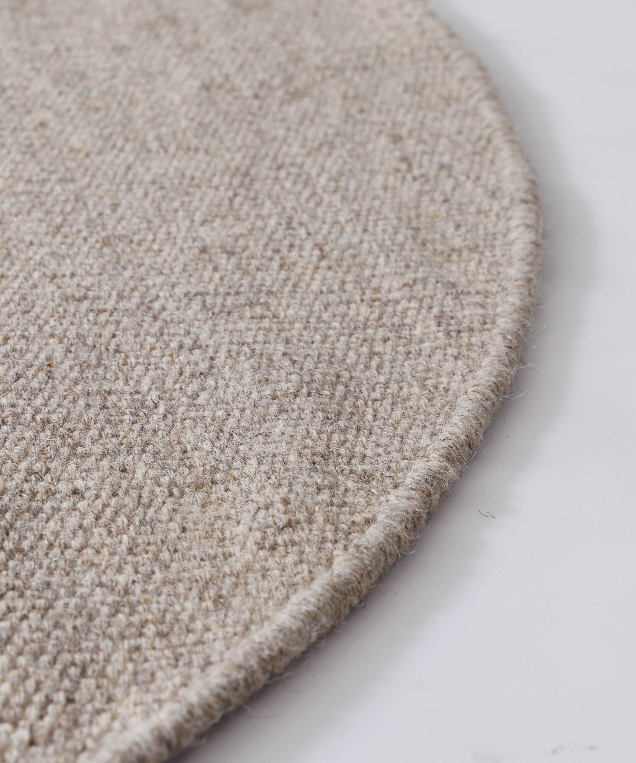 Rond wollen vloerkleed - Grund grijs - close up Rond wollen vloerkleed - Grund grijs - close up