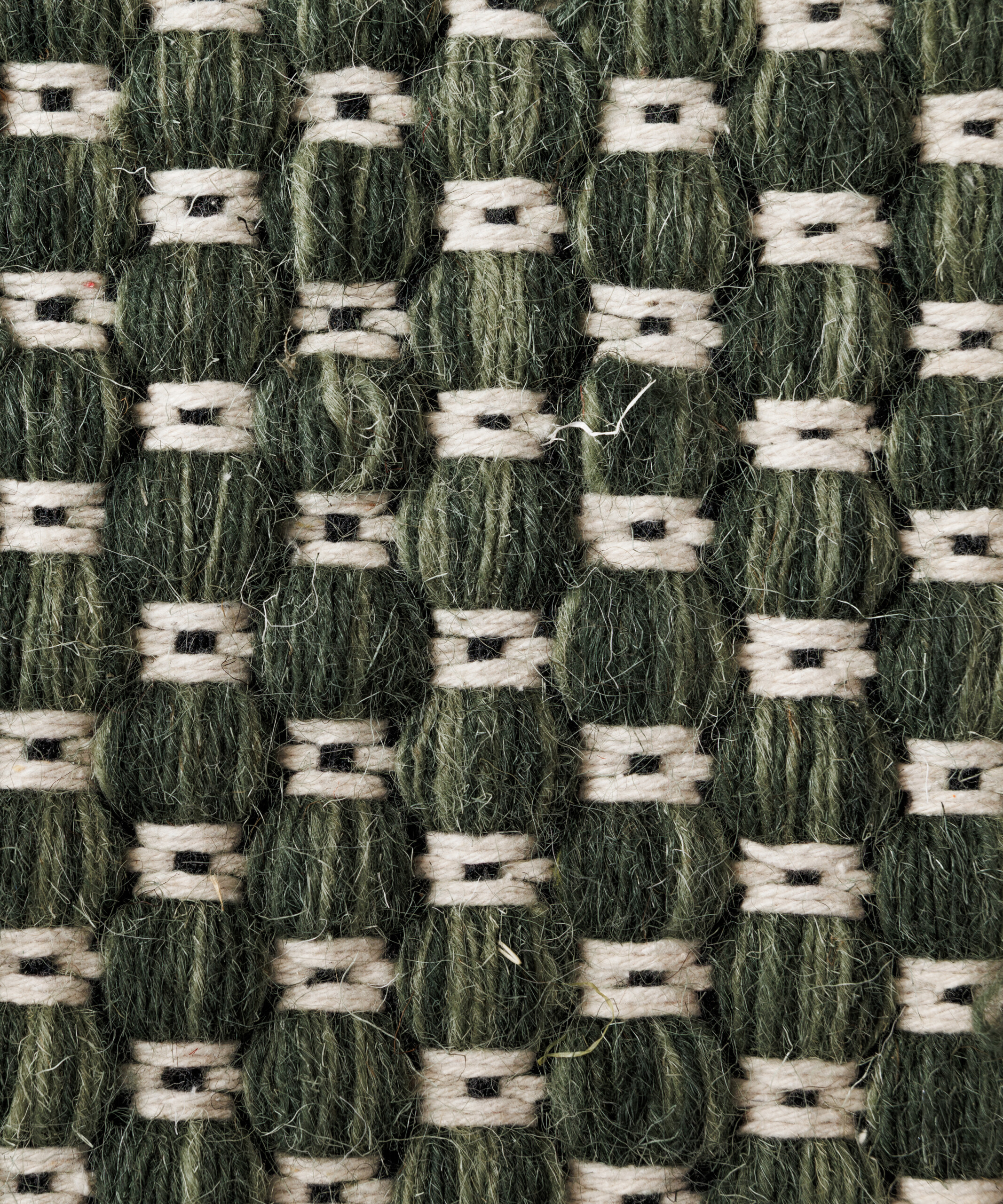 Wollen vloerkleed - Huldra groen - close up Wollen vloerkleed - Huldra groen - close up