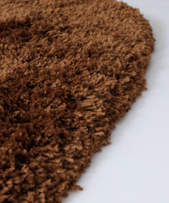 Organisch vloerkleed Shaggy - Sveve cognac - close up, thumbnail
