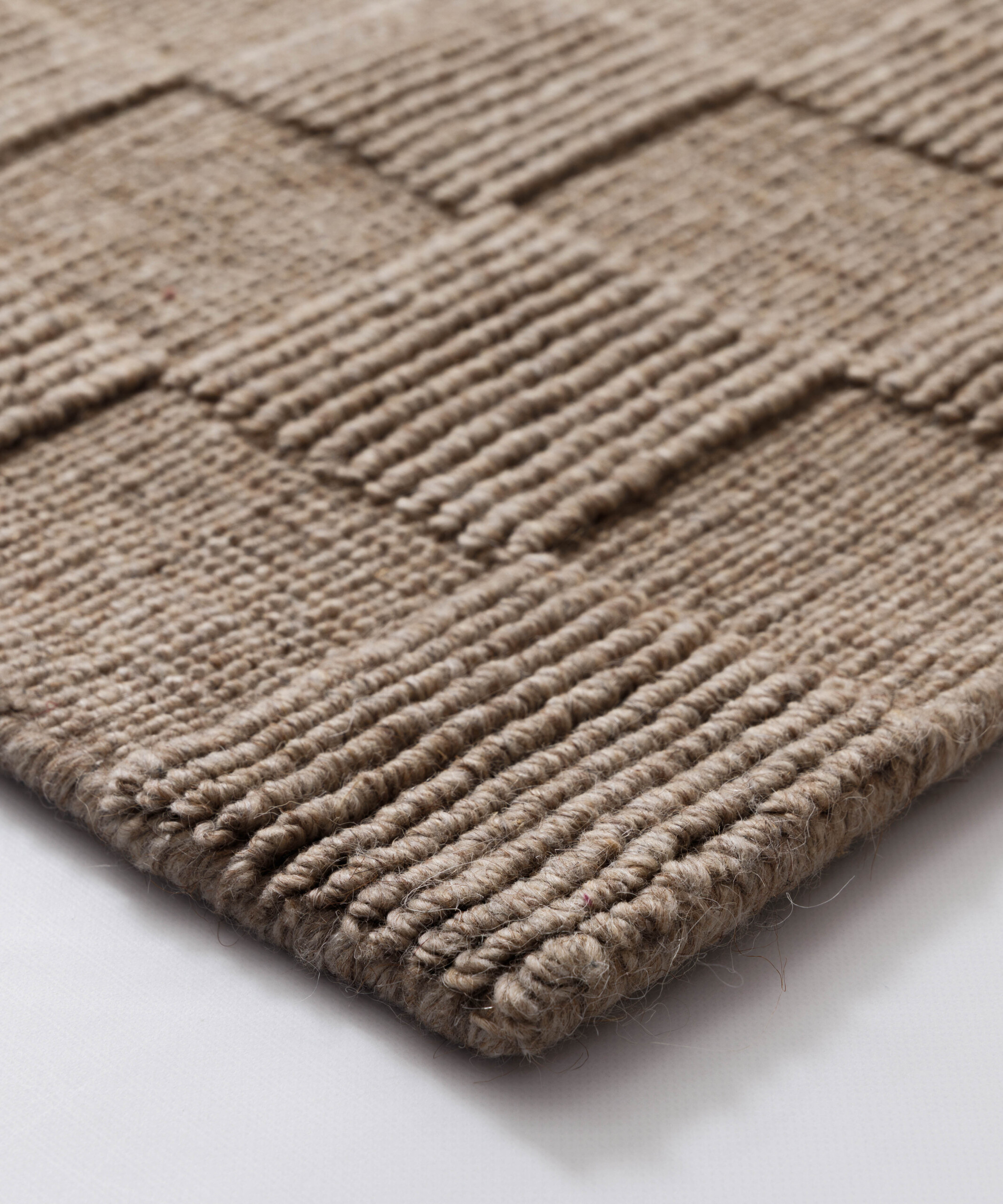Wollen vloerkleed - Tavle taupe - close up Wollen vloerkleed - Tavle taupe - close up